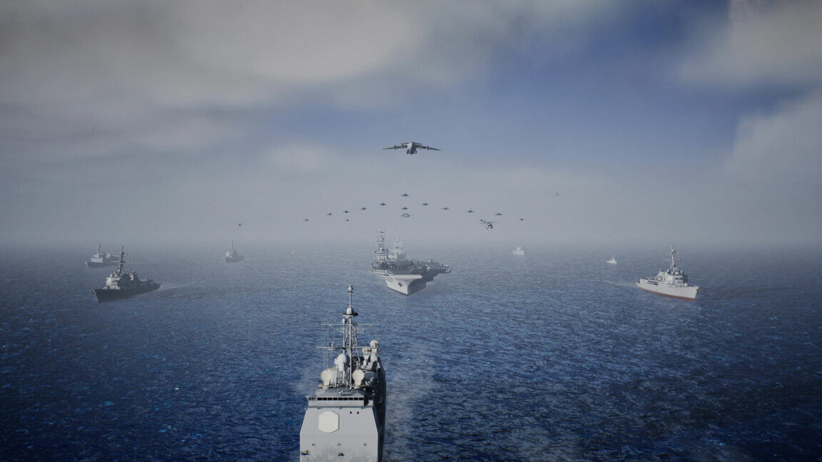 fleet of naval ships and aircraft operate in a misty ocean environment under a cloudy sky.
