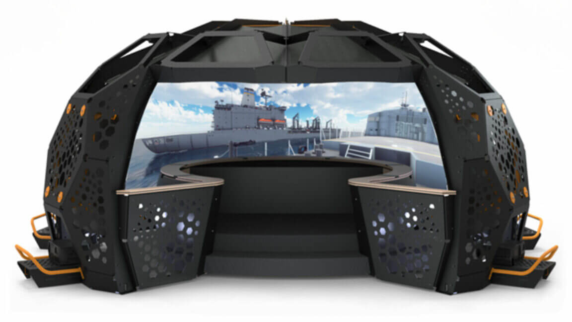 futuristic, hexagonal structure with a large screen displaying a ship at sea, featuring curved seating areas.