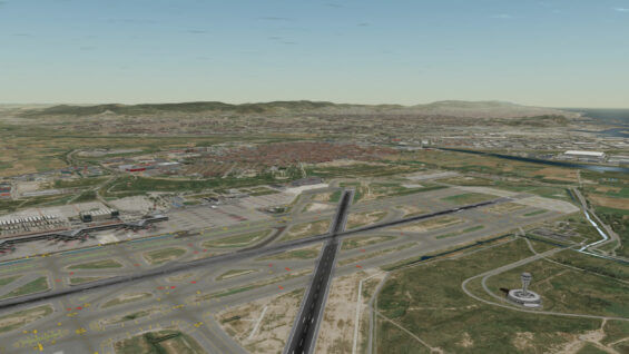 Aerial view of an airport with runways, taxiways, and surrounding landscape, including hills and urban areas.